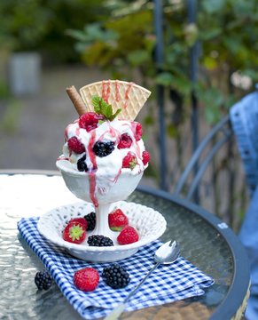 softijs with berries and cream. ice-cream with fruits in a cube