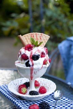 softijs with berries and cream. ice-cream with fruits in a cube