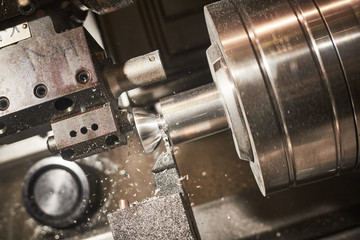 turning cnc machine at metal work industry. Multitool precision manufacturing and machining