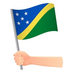 Solomon Islands flag in hand