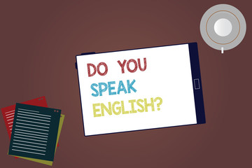 Word writing text Do You Speak Englishquestion. Business concept for Speaking learning different languages Tablet Empty Screen Cup Saucer and Filler Sheets on Blank Color Background