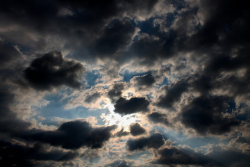 Naklejka na ściany i meble Sky with a heart-shaped hole in the cloud
