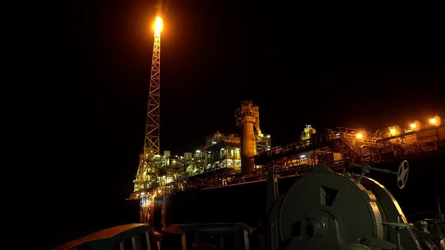 FPSO tanker vessel near Oil platform Rig. Offshore oil and gas industry, sea oil production and storage.