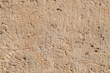 Texture of processed ancient marble block. Traces of ancient tools