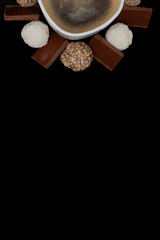 Cofe, Stack of Black and White Chocolate isolated on black background, place for text