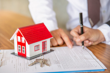 Business Signing a Contract Buy - sell house, Home for rent concept, broker agent presenting and...