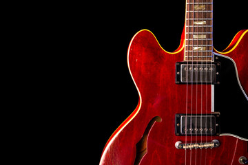 Fototapeta na wymiar Vintage Electric Guitar, red, 6 String isolated on black