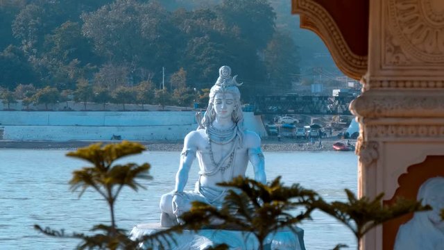 Statue of Shiva in Rishikesh on the banks of the holy river Ganges. Shot in motion