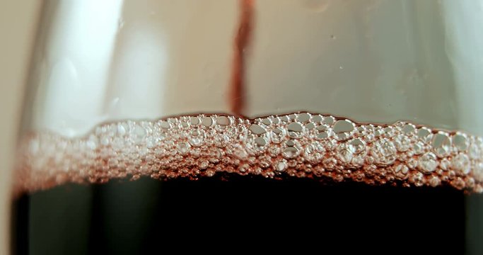 Red wine poured in wine glass 4k