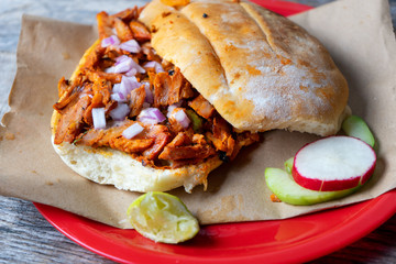 Mexican food: pork sandwich also known as 