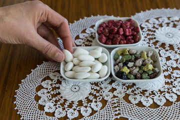 colorful sugars,almonds and candies in the plate for Muslim Ramadan feast.