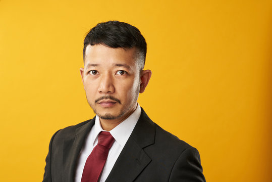 Headshot of professional asian man
