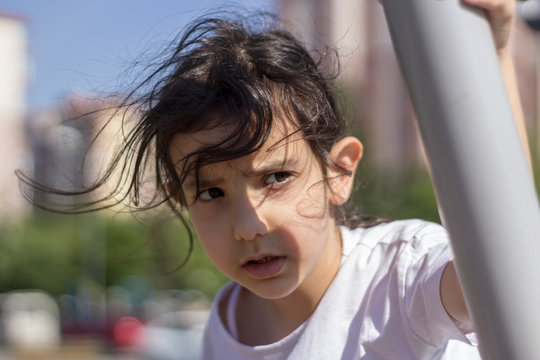 A litttle girl portrait outdoor clouse up
