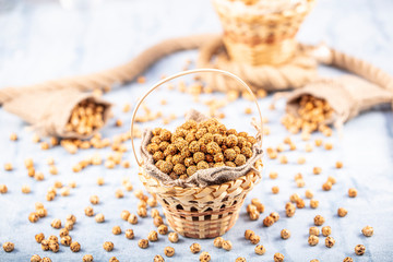 Healthy and tasty roasted chickpeas (Leblebi) snack with different spices. .sesame seeds, honey and...