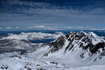Fototapeta na wymiar Panoramic view of Mount St Helens crater with Spirit lake and Mount Rainier in distance. Mount St Helens National Volcanic Monument. Washington. United States of America.