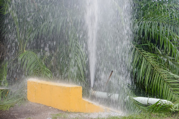 Splatter of water from broken pipe