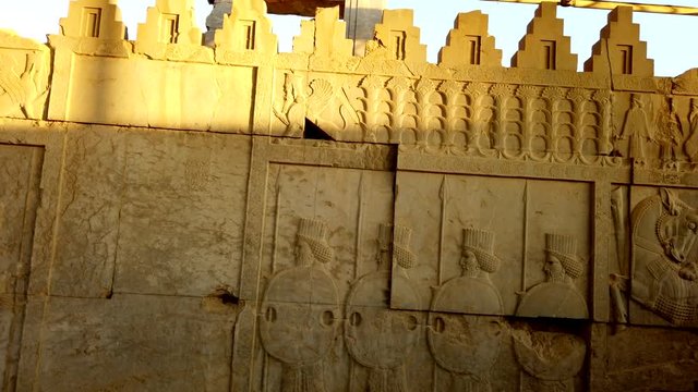 Bas Relief Carvings of Soldiers at Persepolis at Sundown.