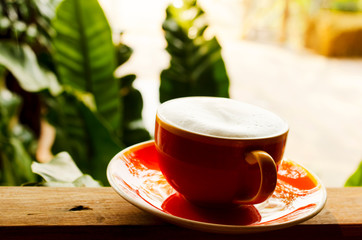 Capucino coffee drink cups on windows backgrounds