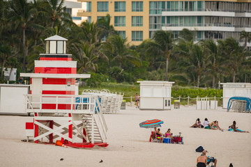 Tourists by Miami Beach lifeguard hut