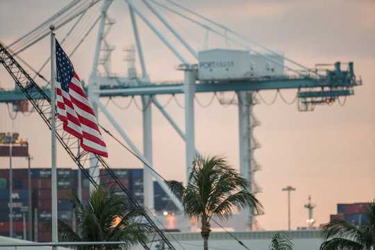 Focus on American Flag with Port Miami in background