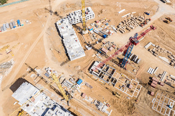 aerial top view of city construction site. building of new apartment complex. drone image.