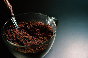 coffee powder on black background.