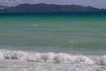 The waves on the beach