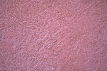 Fototapeta premium pink plaster on a concrete wall