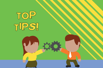 Handwriting text writing Top Tips. Conceptual photo small but particularly useful piece of practical advice Standing young couple sharing gear. Man tie woman skirt commerce relation