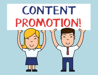 Writing note showing Content Promotion. Business concept for about getting content in front of the right audience Two Smiling People Holding Poster Board Overhead with Hands