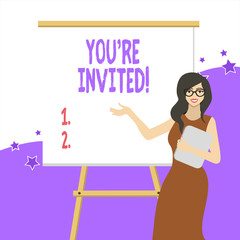 Handwriting text writing You Re Invited. Conceptual photo make a polite friendly request to someone go somewhere White Female in Glasses Standing by Blank Whiteboard on Stand Presentation