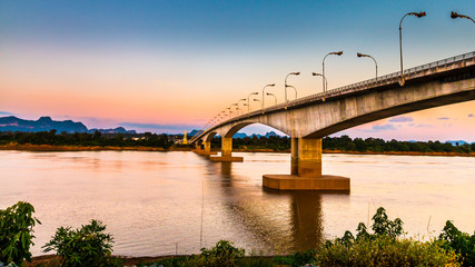 Fototapeta na wymiar Mekong bridge over the river with blue sky, Bridge over the Mekong River at Thailand