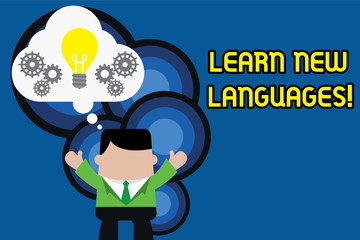 Text sign showing Learn New Languages. Business photo text developing ability to communicate in foreign lang Standing man suit hands up imaginary bubble light bulb gears working together