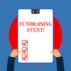 Handwriting text writing Fundraising Event. Conceptual photo campaign whose purpose is to raise money for a cause White rectangle clipboard with blue frame has two holes holds by hands