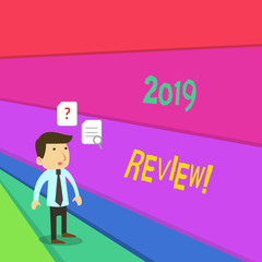 Text sign showing 2019 Review. Business photo showcasing remembering past year events main actions or good shows Young Male Businessman Office Worker Standing Searching Problem Solution