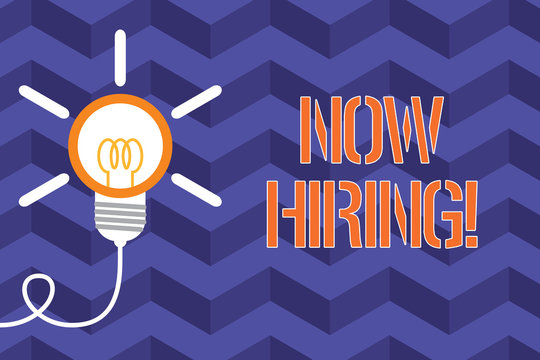 Text sign showing Now Hiring. Business photo text finding evaluating working relationship with future employees Big idea light bulb. Successful turning idea invention innovation. Startup