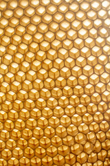The texture of empty wax honeycombs built by bees, without human involvement