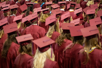 graduation caps and gowns