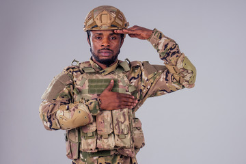 military army african male camouflage suit sorrow white background studio