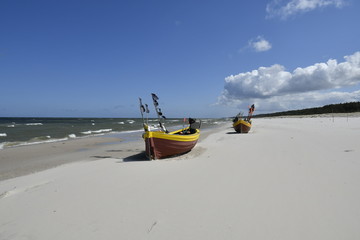 Pomeranian fishing boats on the beautiful beach of Debki
