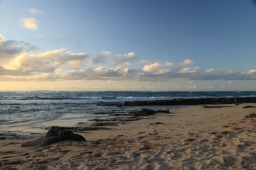Dusk and sun setting over a beautiful ocean