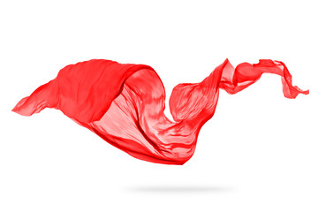 Flying piece of coloured cloth on white background