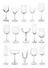 Set of different empty glasses on white background
