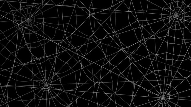 few cobwebs move against a black background