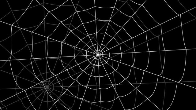 few cobwebs move against a black background