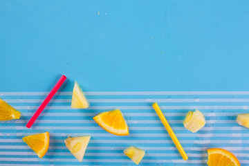 tropical fruits on the blue background