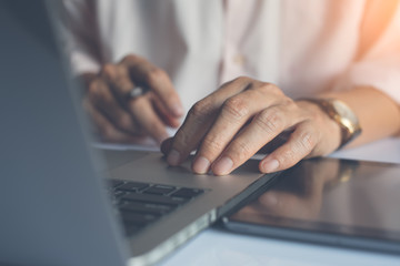 Fototapeta premium Businessman working on laptop computer