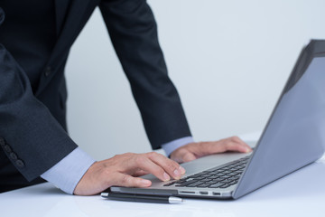 Businessman working on laptop computer