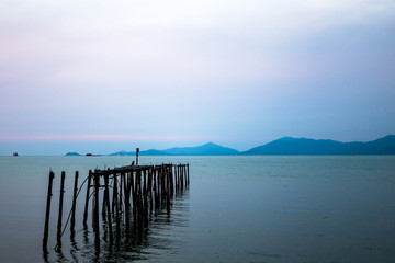 Pier Pylons in the Sea during Sunset