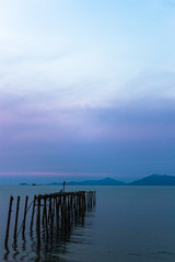 Pier Pylons in the Sea during Sunset